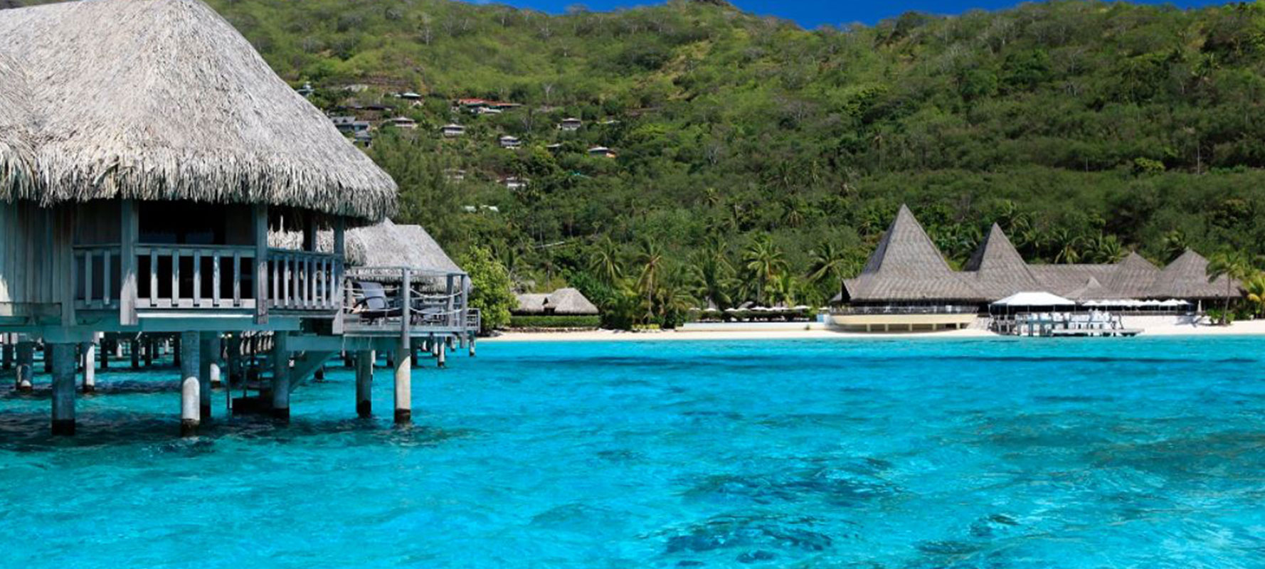 Overwater bungalow resort setting in Moorea, Tahiti